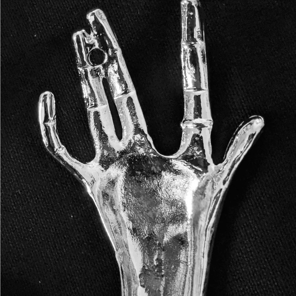 Silver hands belt by Nicoletta Carlone